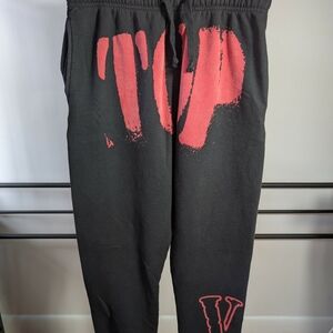 Black Sweatpants with Red Graphic 'V'